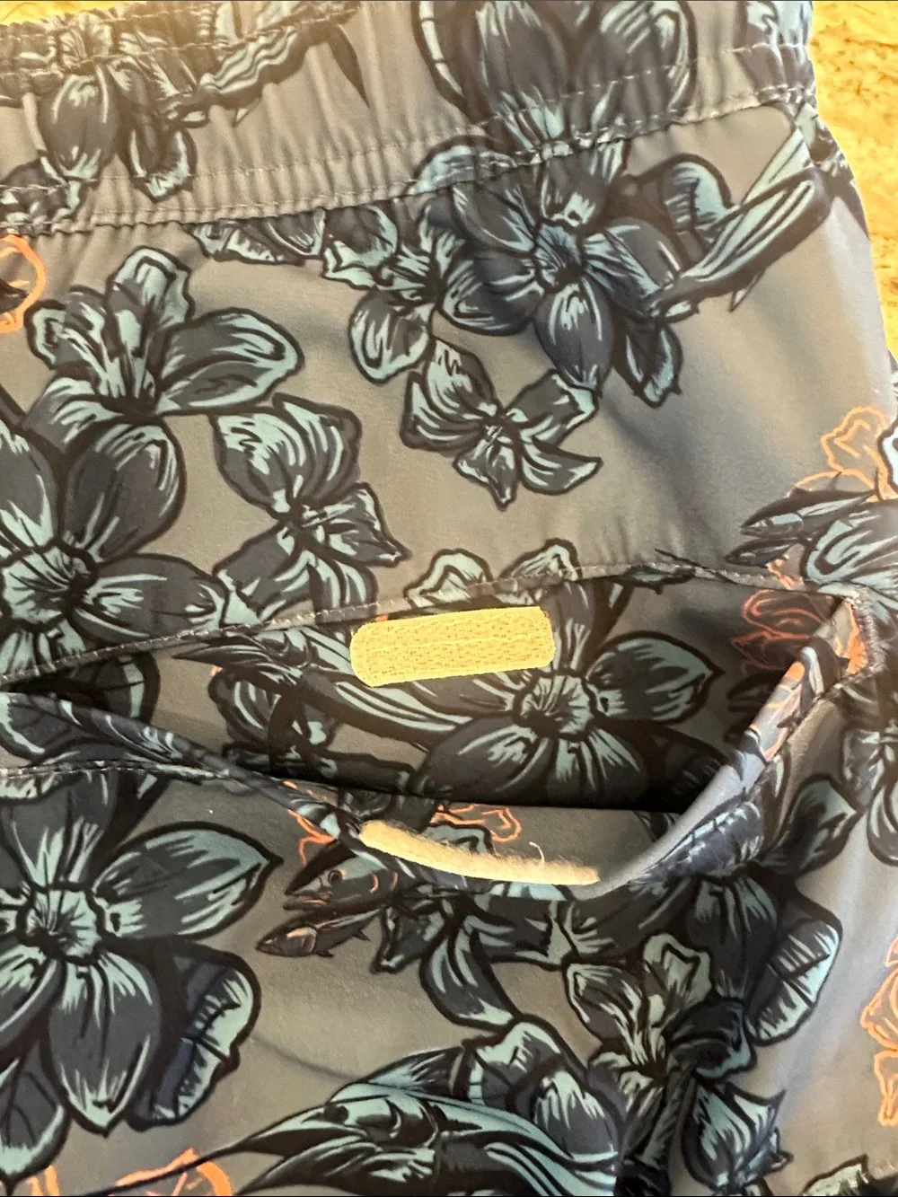 Huk Men’s Blue Floral Swim Trunks with Coral Drawstring